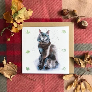 Carte de salutations de chat noir moelleux