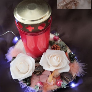 Grave arrangement with candle orange/white