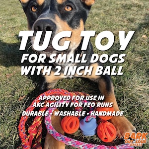 May include: A dog tug toy for small dogs with a 2-inch ball. The toy is made of a durable, washable, and handmade rope with three balls. The text on the image says "TUG TOY FOR SMALL DOGS WITH 2 INCH BALL".