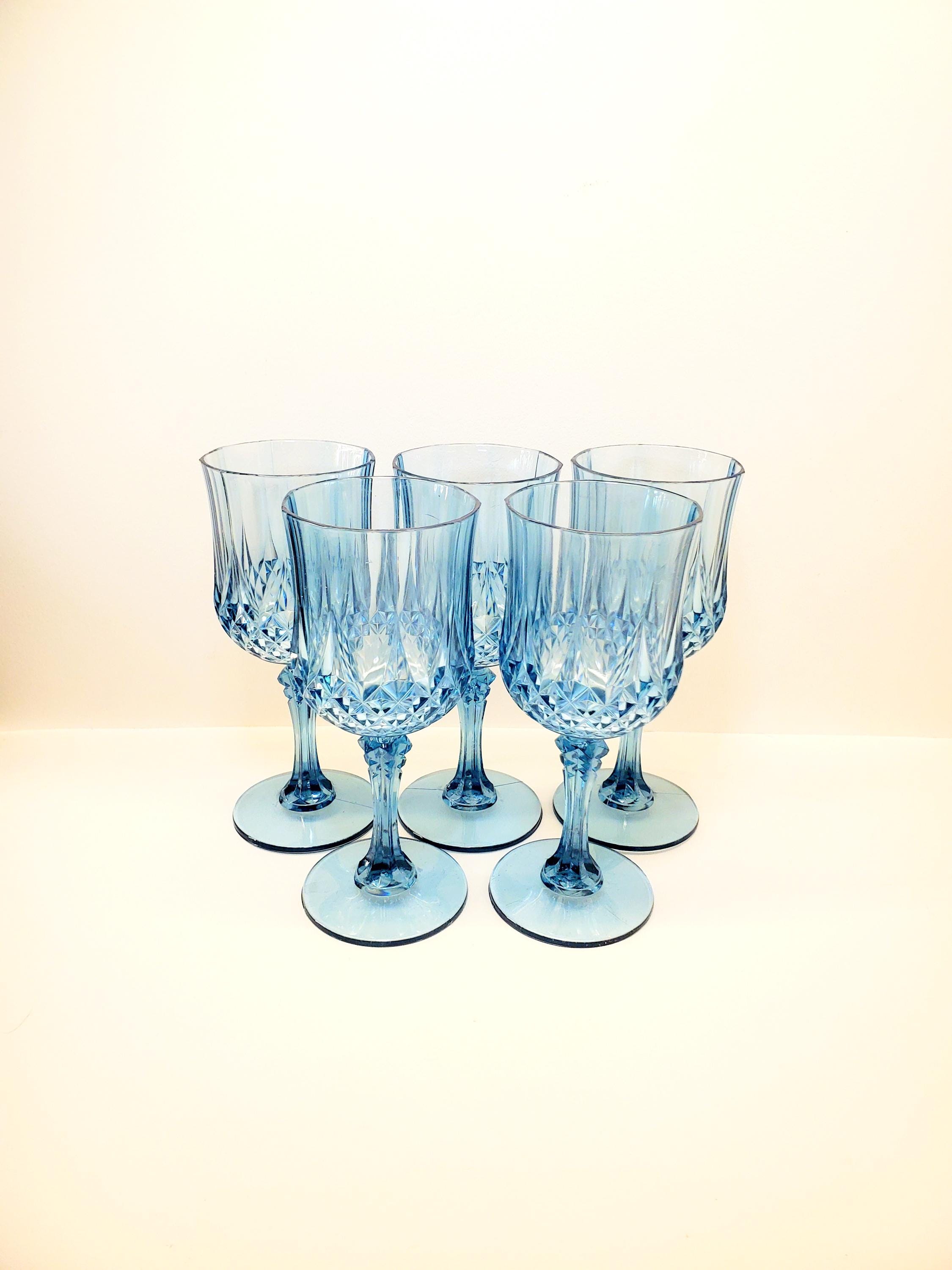 Crystal Clear Blue Plastic Glasses in the Style of Longchamp by