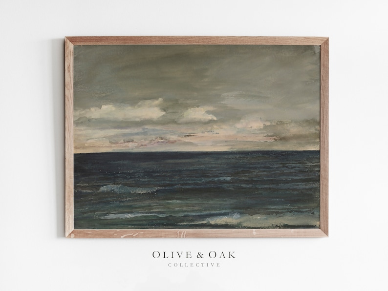 May include: A framed painting of a seascape with a cloudy sky and a dark blue ocean. The painting is in a light wood frame.