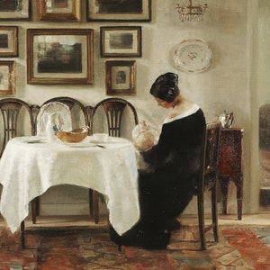 May include: A painting of a woman in a black dress seated at a table, possibly preparing tea. The room is decorated with framed pictures, a chandelier, and a table covered with a white cloth. The scene suggests a moment of calm in a domestic setting.