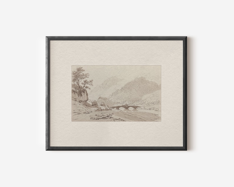 May include: A framed black and white pencil drawing of a landscape with a bridge over a river. The drawing depicts a mountain range in the background, a river in the foreground, and a bridge crossing the river. There are trees on the left side of the drawing.