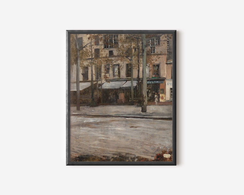 May include: A painting depicting a street scene in Paris, France. The painting features a row of buildings with storefronts and trees lining the street. The buildings are painted in muted tones of brown, gray, and white, while the trees are a deep green. The street is paved with cobblestones and is empty of people.