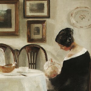 May include: An oil painting shows a woman in a black dress, seated at a table, holding a baby. The table is set with a white tablecloth, a bowl, and a cup. Framed pictures and a plate hang on the wall.