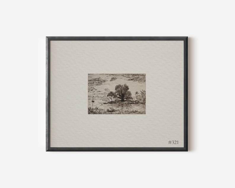 May include: A black and white pen and ink drawing of a tree on an island in a lake. The drawing is framed in a black frame with a white mount. The number #321 is printed in the bottom right corner of the mount.