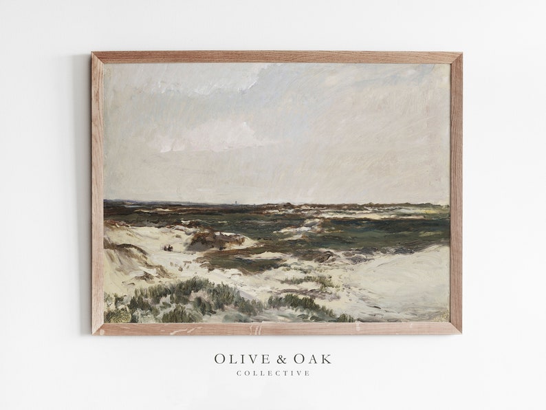 May include: A framed painting depicting a landscape with a sandy beach and green dunes under a cloudy sky.