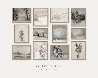 May include: A collection of framed winter landscape art prints. The prints feature snowy scenes of trees, mountains, and cabins in muted tones. The Olive & Oak Collective logo is at the bottom.