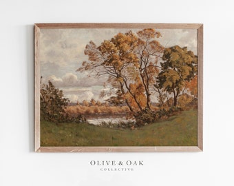 May include: A framed painting depicting a landscape scene with a river, trees, and a cloudy sky. The trees are in shades of green, brown, and yellow, and the river is a light blue. The sky is a light blue with white clouds.