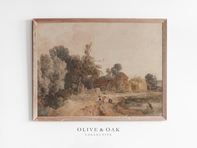 May include: A framed watercolor painting depicting a rural landscape with a farmhouse, trees, and a dirt road. The sky is a soft pink and the trees are a mix of green and brown. The painting is in a light wood frame.