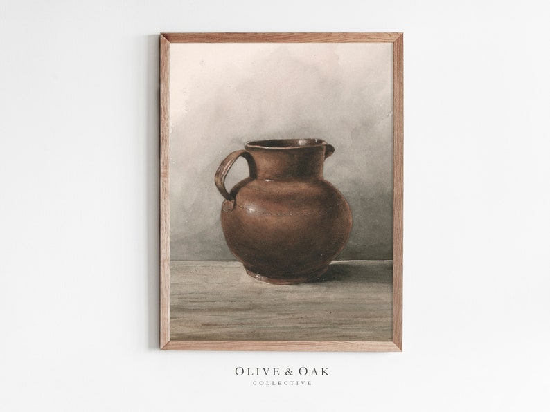 May include: A watercolor painting of a brown ceramic pitcher on a wooden table. The background is a soft, light gray.