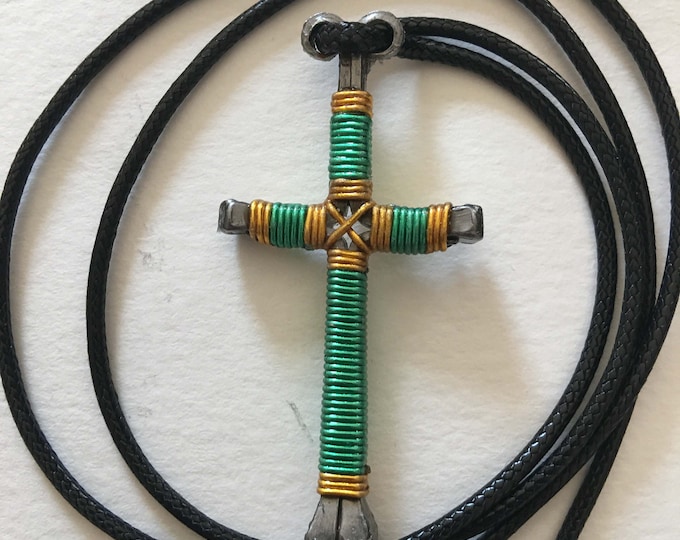Hand made "Cross Your Heart"  design horseshoe nail cross pendant
