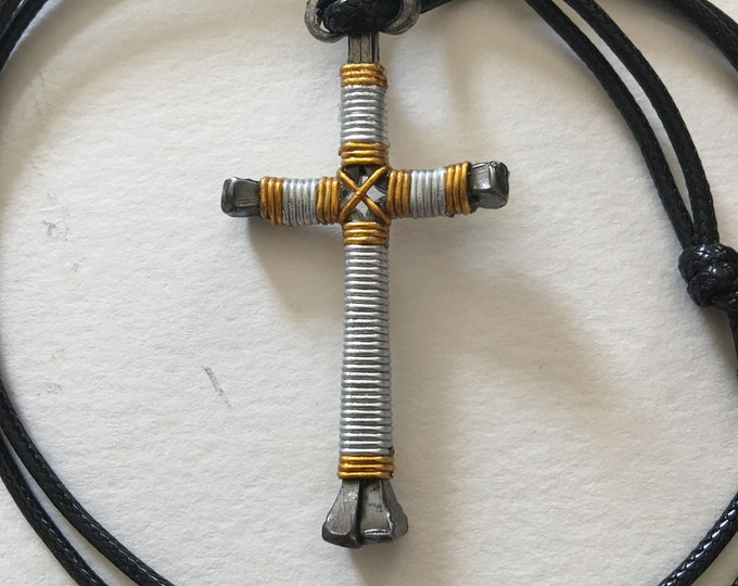 Hand made "Cross Your Heart"  design horseshoe nail cross pendant