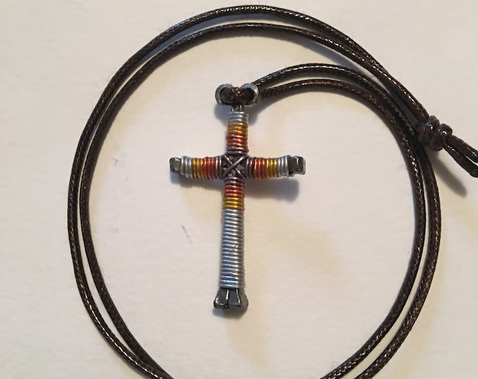 Hand made "Sunburst"  design horseshoe nail cross pendant