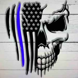 May include: A black and white skull graphic with a thin blue line and an American flag design. The skull is facing right and the flag is on the left side of the skull.