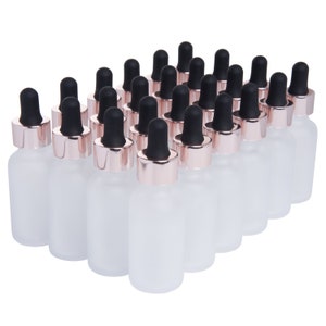 May include: A set of 20 frosted glass bottles with rose gold caps and black droppers. The bottles are arranged in a triangular pattern.