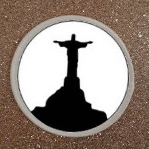 May include: A black silhouette of the Christ the Redeemer statue in Rio de Janeiro, Brazil, on a white background.