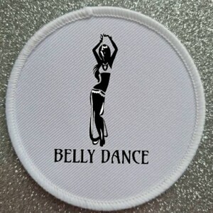 May include: White round fabric patch with a black silhouette of a woman in a belly dancing pose. The text "Belly Dance" is printed below the silhouette.