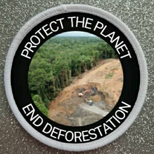 3-tums sublimeringsmärke med titeln "End Deforestation".