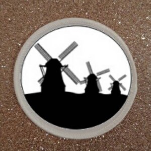 May include: A white circle with a black silhouette of three windmills against a white background.