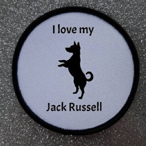 May include: White round patch with black text and a black silhouette of a Jack Russell terrier. The text reads "I love my Jack Russell".
