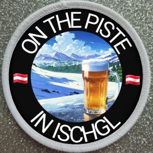 May include: A white and black round patch with the text "On the Piste in Ischgl" in white. The patch features a snowy mountain scene with a glass of beer in the foreground. The Austrian flag is on either side of the patch.