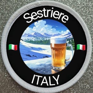May include: A circular patch featuring the words "Sestriere ITALY" and a beer mug illustration set against a snowy mountain scene. The patch has a black backdrop, a white border, and Italian flag emblems.