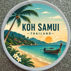 May include: Round patch with a tropical beach scene. The image features a palm tree, a boat, and the text "KOH SAMUI - THAILAND." The artwork is in shades of blue, green, and yellow, with a white border.