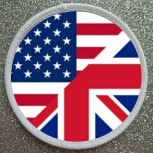 May include: A circular patch displaying the flags of the United States and the United Kingdom. The design is split, with the American flag on the left and the Union Jack on the right. The patch is edged with a white border.