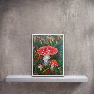 May include: A painting of three red and white mushrooms with white spots growing in a forest setting. The mushrooms are surrounded by green leaves and ferns.