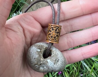 Natural Hagstone Talisman on waxed Cotton cord