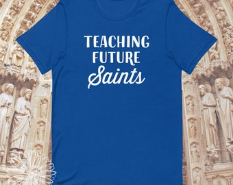 Teaching Future Saints Unisex t-shirt, Catholic Shirt, Catholic School, Catholic Teacher, Homeschool Mom, Catholic Schools Week