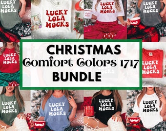 May include: A collection of t-shirts in various colors, each featuring the text "LUCKY LOLA MOCKS" in a playful font. The image is framed with a Christmas theme, with festive decorations and cozy settings.