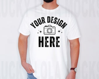 May include: White t-shirt with a black graphic design that says "Your Design Here" with a camera icon and stars.