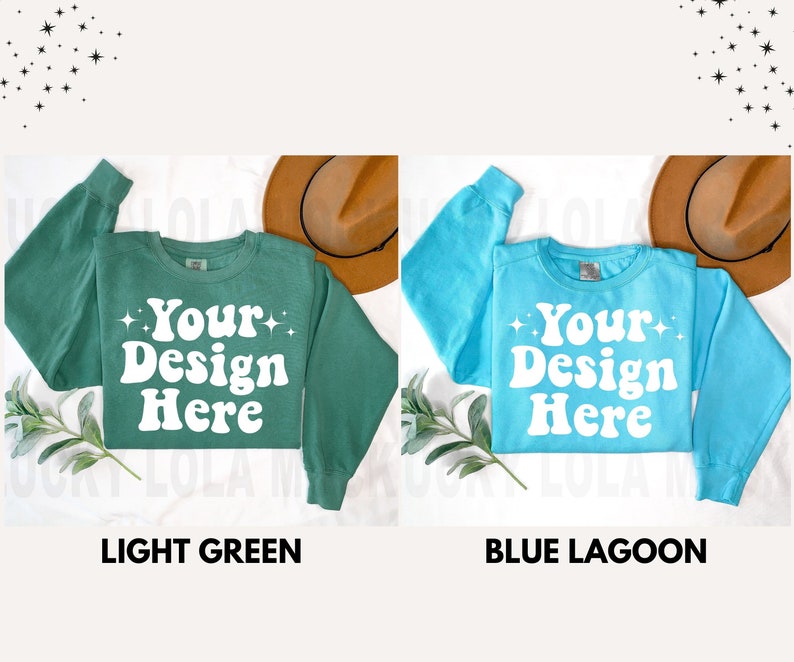 May include: Two crew neck sweatshirts, one light green and one blue, with the text "Your Design Here" in white retro font.