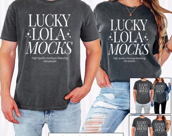 May include: Three mockups of a charcoal gray t-shirt with the text "LUCKY +LOLA+ MOCKS" in white. The text is centered on the shirt and is surrounded by a white border. The mockups show the shirt on a man and a woman, as well as a flat lay of the shirt. The text "High-quality mockups featuring real people." is below the main text on the shirt. The text "3 MOCKUPS 1 SIZE CHART" is at the bottom of the image.