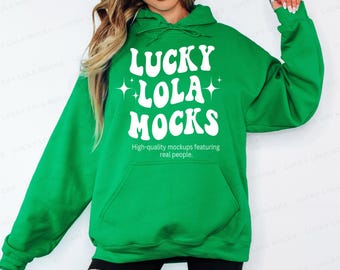 May include: A bright green hoodie with the text "LUCKY LOLA MOCKS" in white, along with the tagline "High-quality mockups featuring real people." The hoodie has a front pocket and a drawstring hood.