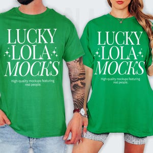 May include: Two green t-shirts with the text "LUCKY LOLA MOCKS" in white. The text is centered on the shirts and is surrounded by small white stars. The shirts are high-quality mockups featuring real people.