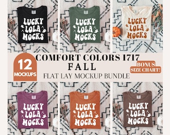 May include: A flat lay mockup bundle featuring six t-shirts in various colors: black, green, cream, purple, orange, and brown. Each shirt displays the text "LUCKY LOLA MOCKS" with a ghost graphic. The image also includes text that reads "COMFORT COLORS 1717 FALL FLAT LAY MOCKUP BUNDLE".
