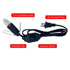 May include: A black electrical cord with a US standard plug, a dimmer switch, and a butterfly clip. The cord has an E12 candelabra bulb attached to it.