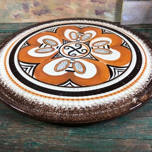Vintage brown orange trivet