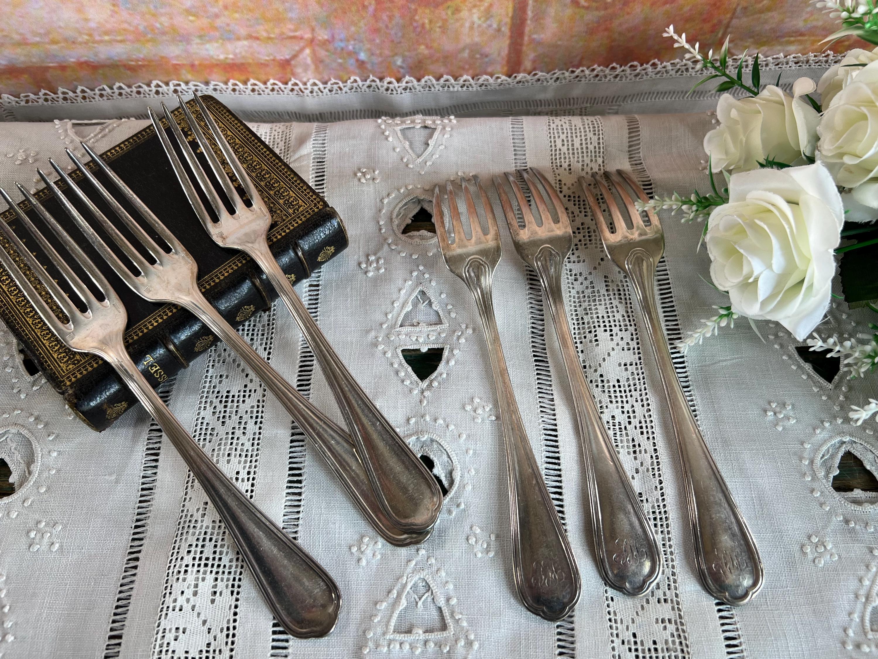Lot de 12 couverts signé Christofle modèle Spatours en métal argenté