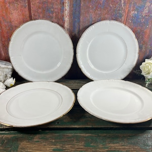 Grande assiette Vintage blanche et dorée. Ces belles assiettes