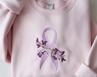 Sudadera bordada con lazo morado: Concientización sobre el cáncer de páncreas