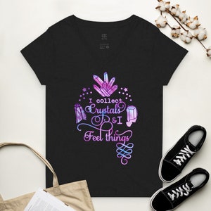 May include: Black v-neck t-shirt with a purple and blue watercolor design of crystals and the text "I collect crystals & I feel things".