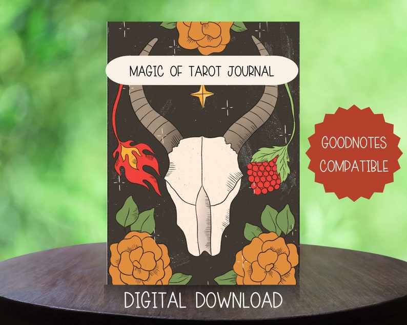 May include: A digital download tarot journal with a dark background. The cover features a white skull with horns, surrounded by orange flowers, green leaves, and a red flame. The text "MAGIC OF TAROT JOURNAL" is displayed on the top.