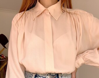 Vintage 1980s pastel peach blouse with shoulder/back pleat detailing
