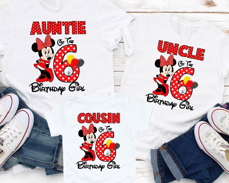 May include: Three white t-shirts with red polka dot Minnie Mouse designs. The shirts say "Auntie of the Birthday Girl", "Uncle of the Birthday Girl", and "Cousin of the Birthday Girl".