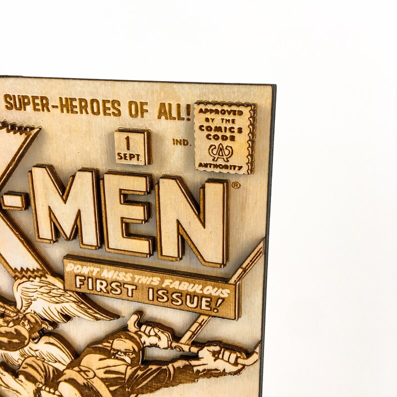 May include: A wooden cutout of a vintage comic book cover featuring the X-Men. The cover is brown and features the text "SUPER-HEROES OF ALL!" and "X-MEN". The cover also includes the text "DON'T MISS THIS FABULOUS FIRST ISSUE!" and a seal that reads "APPROVED BY THE COMICS CODE AUTHORITY".
