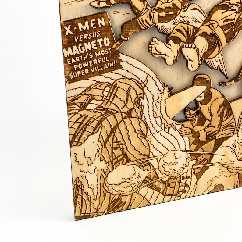 May include: A wood-burned image of a comic book cover featuring the X-Men versus Magneto. The cover text reads "X-Men versus Magneto Earth's Most Powerful Super Villain!"